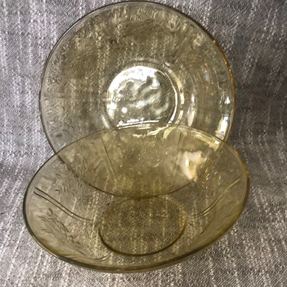 Two vintage depression glass yellow serving bowls.